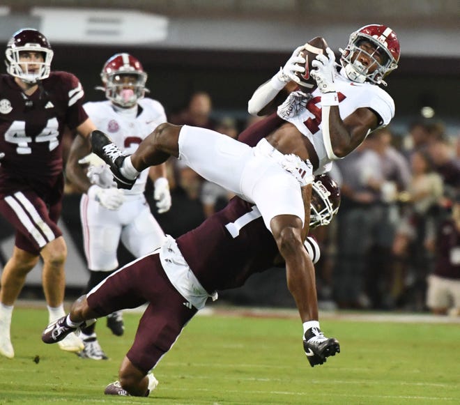 Sep 30, 2023; Starkville, Mississippi, USA; Alabama Crimson Tide tight end Amari Niblack (84) catches a pass over Mississippi State Bulldogs safety Marcus Banks (1) in Davis Wade Stadium at Mississippi State University. Alabama defeated Mississippi State 40-17. Mandatory Credit: Gary Cosby Jr.-Tuscaloosa News