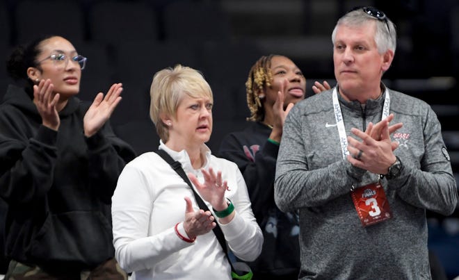 Alabama womens basketball coach claps as Spring Garden's Ace Austin (1) is introduced before her AHSAA Class 1A girls semi-final game at Legacy Arena in Birmingham, Ala., on Monday February 26, 2024.