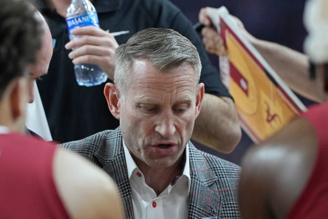 Apr 6, 2024; Glendale, AZ, USA; Alabama Crimson Tide head coach Nate Oats talks to players during a timeout against the Connecticut Huskies in the semifinals of the men's Final Four of the 2024 NCAA Tournament at State Farm Stadium. Mandatory Credit: Bob Donnan-USA TODAY Sports