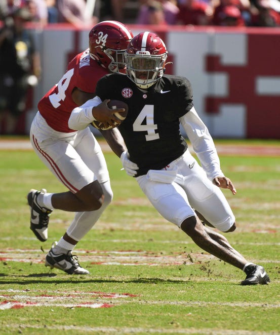 Apr 13, 2024; Tuscaloosa, AL, USA; Alabama quarterback Jalen Milroe (4) runs the ball and is pursued by Alabama defensive back Terrance Howard (34) during the A-Day scrimmage at Bryant-Denny Stadium. Mandatory Credit: Gary Cosby Jr.-USA TODAY Sports