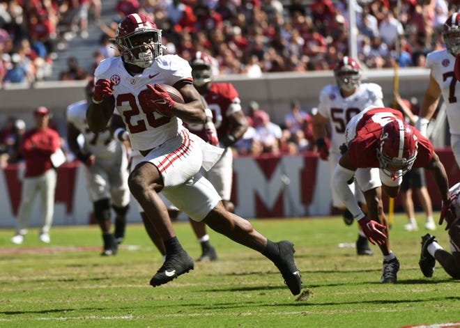 Apr 13, 2024; Tuscaloosa, AL, USA; Alabama running back Jam Miller (26) breaks away from tacklers during the A-Day scrimmage at Bryant-Denny Stadium. Mandatory Credit: Gary Cosby Jr.-USA TODAY Sports