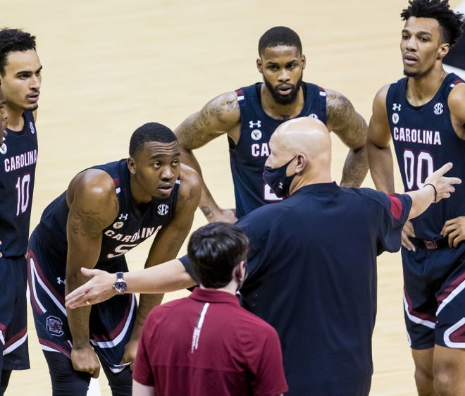 Feb 9, 2021; Columbia, South Carolina, USA; South Carolina Gamecocks head coach Frank Martin directs his team during a timeout against the Alabama Crimson Tide in the first half at Colonial Life Arena. Mandatory Credit: Jeff Blake-USA TODAY Sports