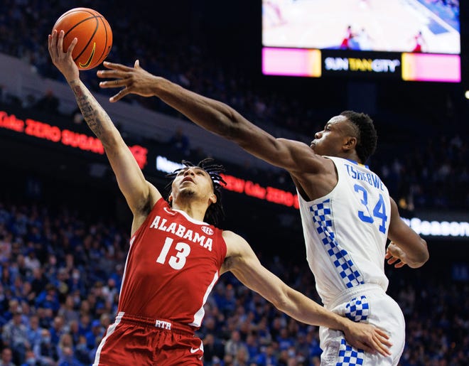 Feb 19, 2022; Lexington, Kentucky, USA; Alabama Crimson Tide guard Jahvon Quinerly (13) goes to the basket during the first half against the Kentucky Wildcats at Rupp Arena at Central Bank Center. Mandatory Credit: Jordan Prather-USA TODAY Sports