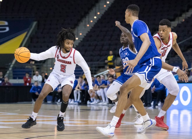 Michael Thomas (2) looks to make a move during the University of Texas at Arlington vs. Louisiana men’s basketball game in the first round of the Sun Belt Conference championship tournament at the Pensacola Bay Center in Pensacola on Thursday, March 3, 2022.